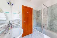 Cuarto de baño en el Hotel Museum Budapest Cuarto de baño en el Hotel Museum Budapest